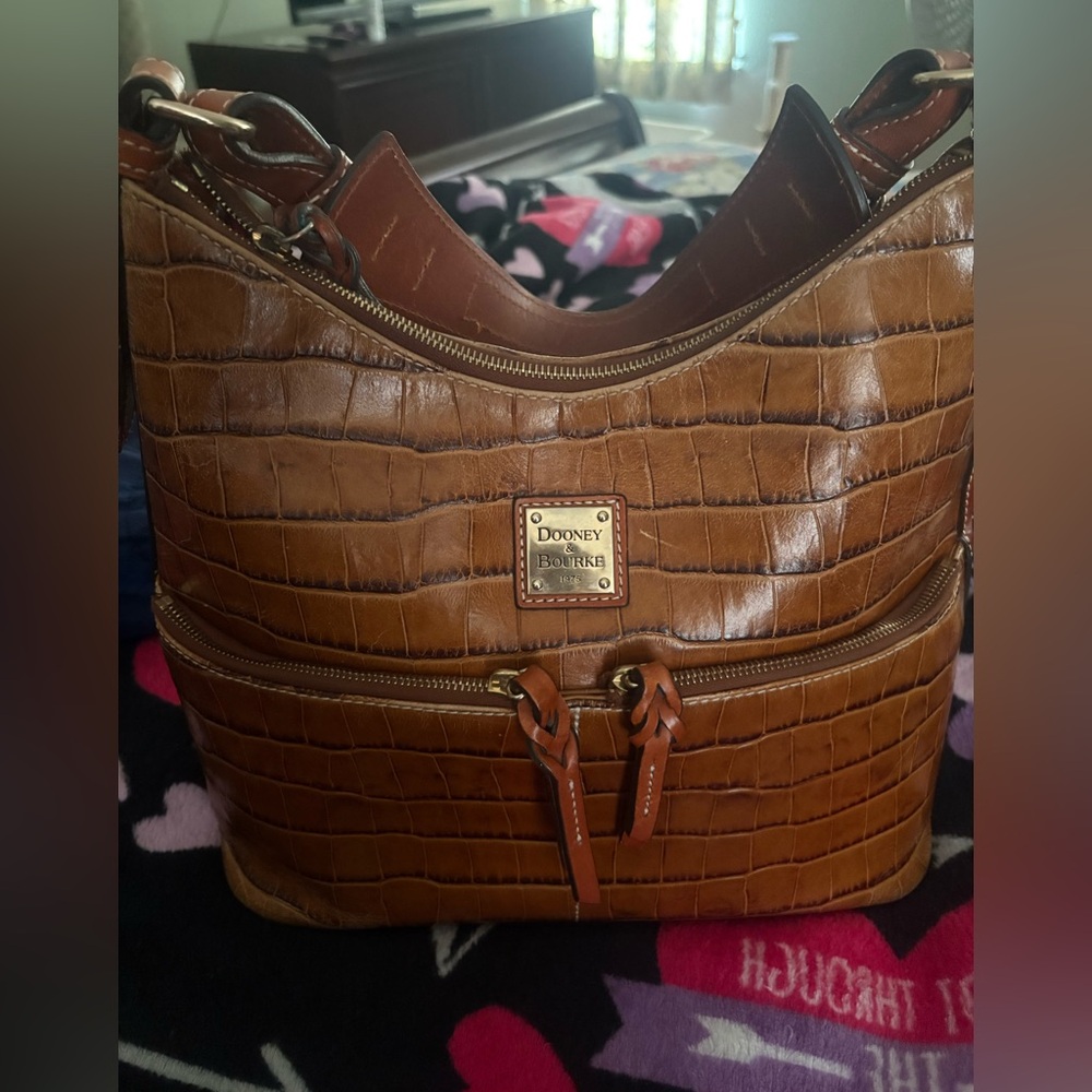 Vintage Embossed Leather Dooney & Bourke with dust bag. Medium purse 12x 16